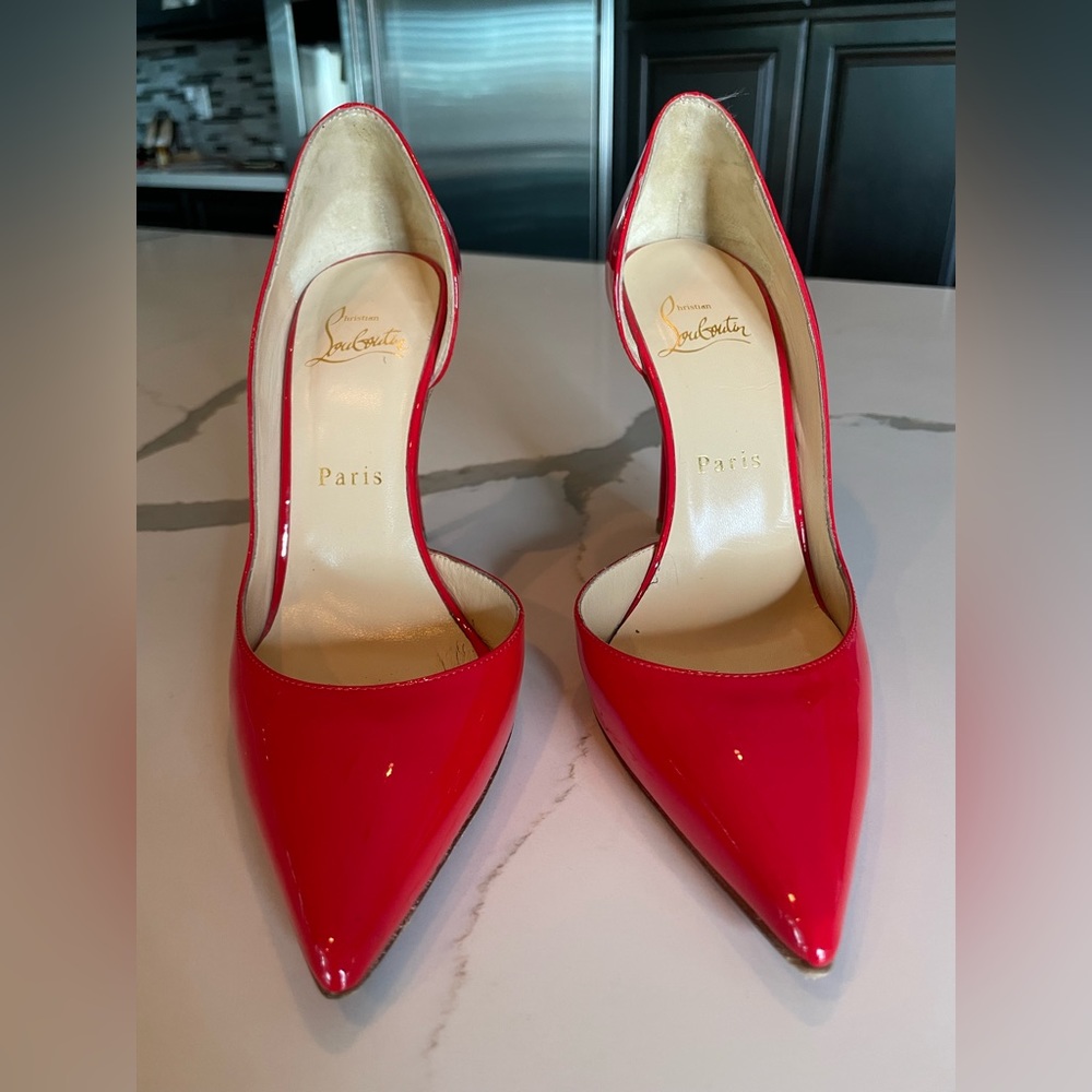 Christian Louboutin size 36.5 Red IRIZA’s with dustbag.. scuff in left heel..